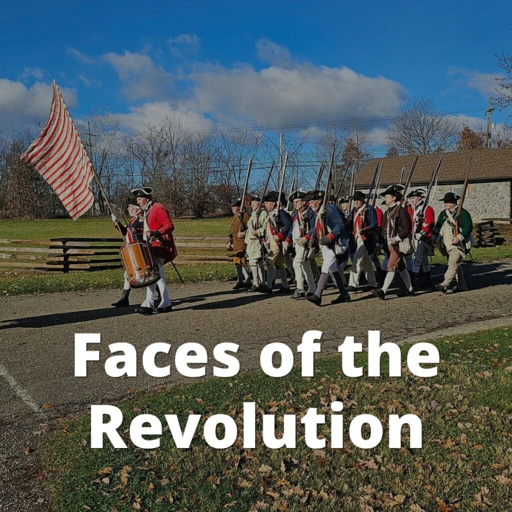 Group of Revolutionary War reenactors marching down the street at Fort Laurens museum. The words Faces of the Revolution are at the bottom of the image.