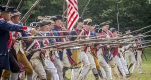 Revolutionary War reenactors at Fort Laurens Museum depicting a battle.