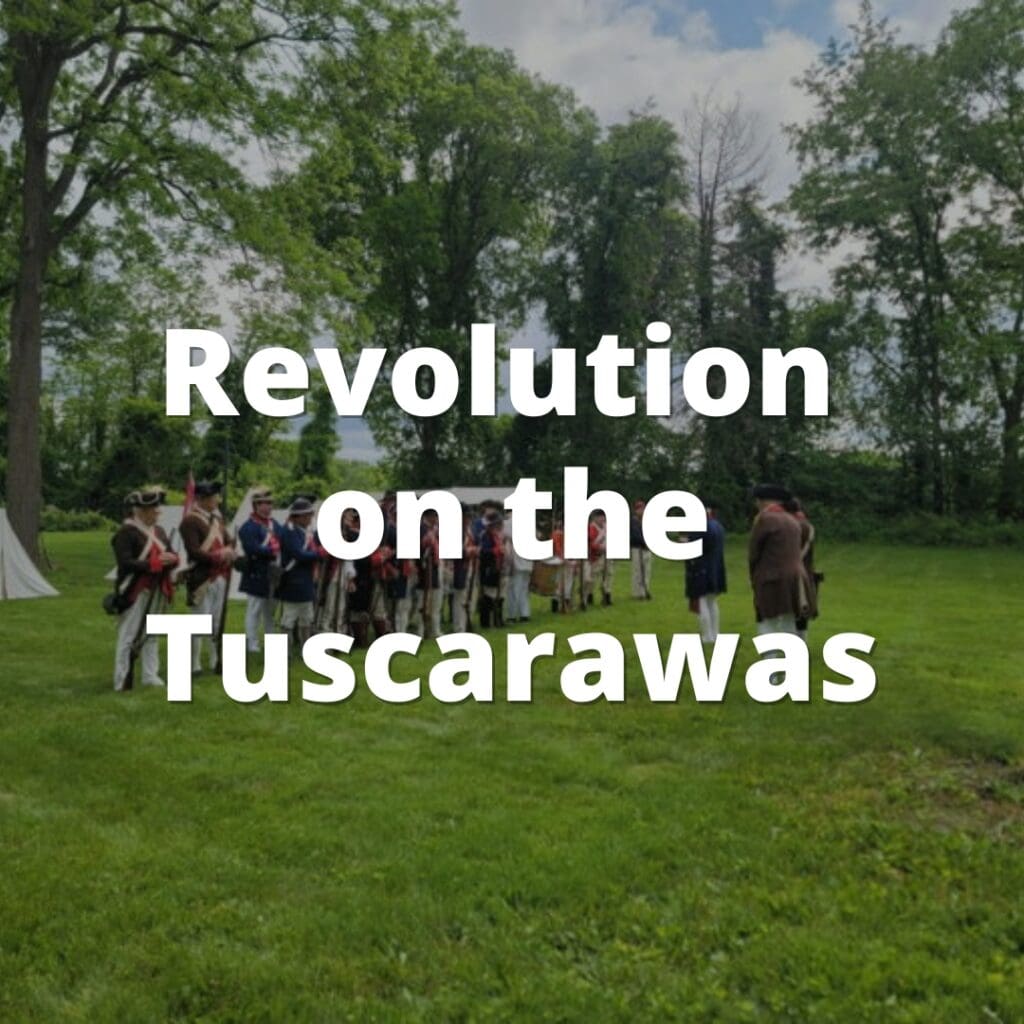 A group of Revolutionary War reenactors lined up outdoors. The image includes the text Revolution on the Tuscarawas.